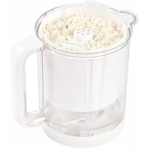 Beaba Rice, Pasta, & Grain Insert with a clear design, featuring rice inside the top compartment for cooking.