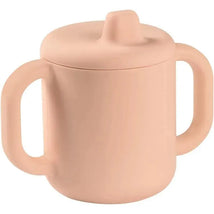 Silicone training cup in rose color with two ergonomic handles and a spill-proof lid, designed for toddlers.