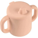 Silicone training cup in rose color with two handles and a spill-proof lid, designed for toddlers.