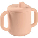 Silicone training cup in rose color with two ergonomic handles and a spill-proof lid, designed for toddlers.