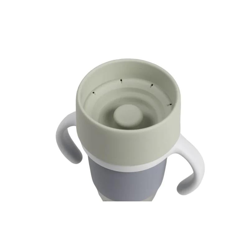Beaba Stainless Steel 360 Learning Cup in Pebble color with two handles and a spill-proof lid.