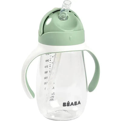 Beaba Straw Sippy Cup in sage green with clear body and measurement markings, designed for children.