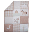 Nursery crib bedding set featuring a patchwork design with farm animals, including a horse, cow, and duck.