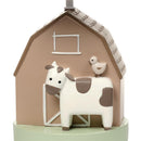 Decorative nursery lamp featuring a cow and a bird atop a barn, designed for a whimsical farmyard theme.
