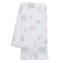 Soft white fleece baby blanket featuring playful patterns in pastel colors, ideal for keeping infants warm and cozy.