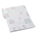 Soft white fleece baby blanket with a variety of simple pastel patterns, perfect for infants.