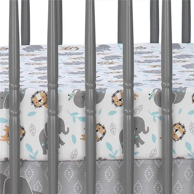 Fitted crib sheet featuring playful elephants and lions on a light background, designed for child comfort.