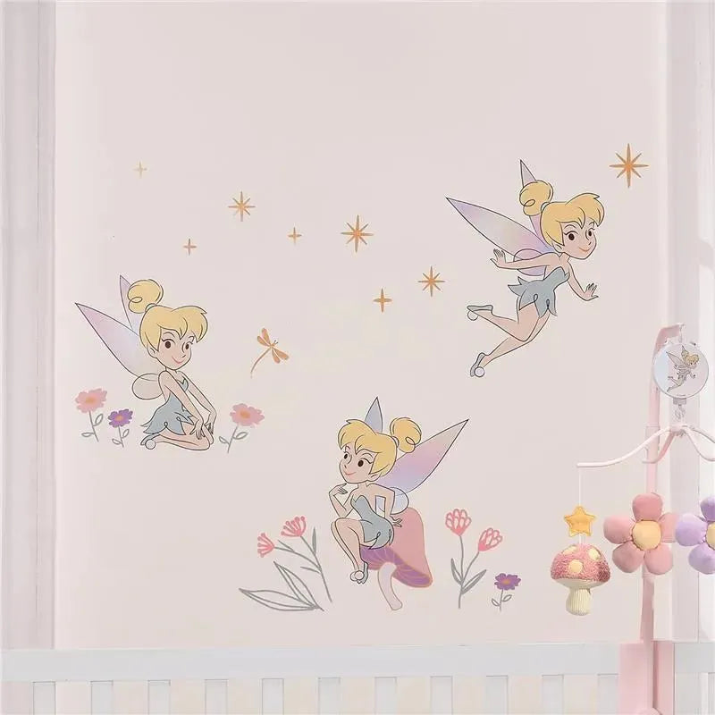 Tinker Bell wall decals featuring three playful poses surrounded by colorful flowers and shimmering stars.