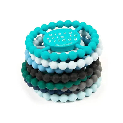 Happy Teether by Bella Tunno, featuring a stack of colorful silicone beads in teal, black, and blue, promoting teething relief.