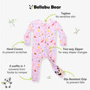 Bamboo convertible footie featuring a pink design with various whimsical patterns, including hand covers and a two-way zipper.