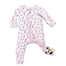Pink bamboo pajamas for kids featuring a milk and cookies print, with a zip closure and contrasting foot design.
