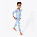 Bamboo kids pajamas featuring Spongebob Squarepants characters, worn by a smiling boy walking.