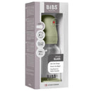 4 oz silicone glass baby bottle by Bibs in sage color, featuring anti-colic design and breast-like nipple.