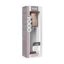 Baby 8oz silicone glass bottle with blush-colored silicone lid, featuring anti-colic design and measurements on the side.
