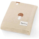 Luxury cotton baby blanket from Bleu La La featuring mushroom patterns on a beige background.