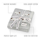 100% luxury cotton baby swaddle blanket by Bleu La La, featuring a sheep design, packaged with a ribbon and care details.