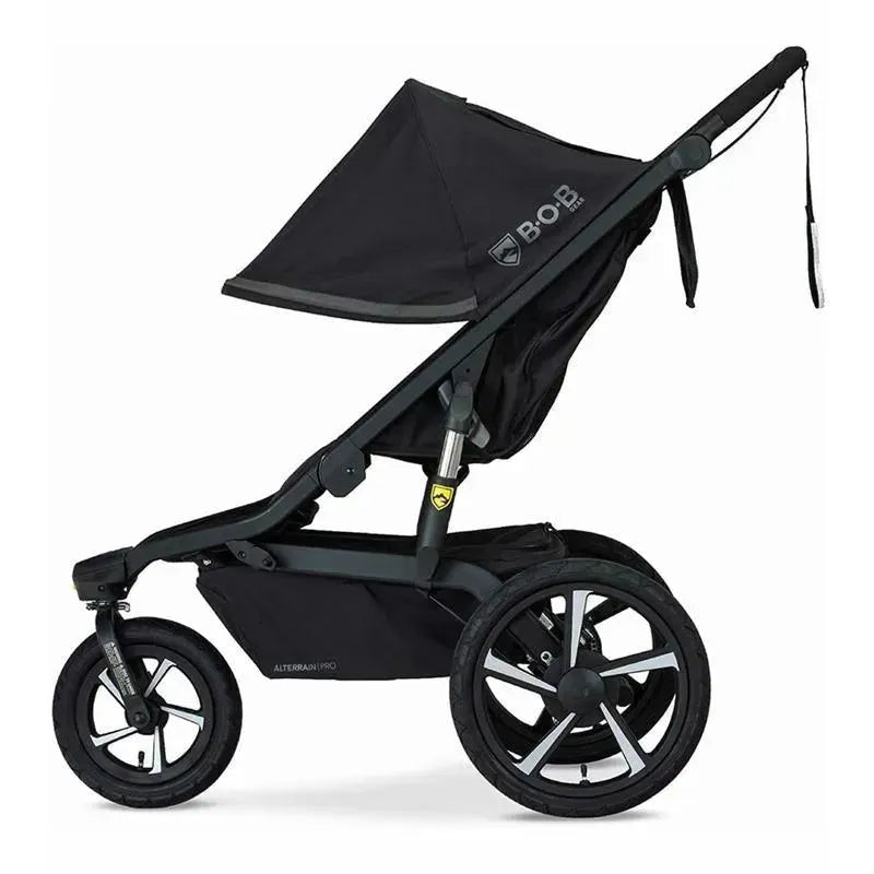 Britax BOB Gear Alterrain Pro All-Weather Jogging Stroller in black, featuring large wheels and a canopy.