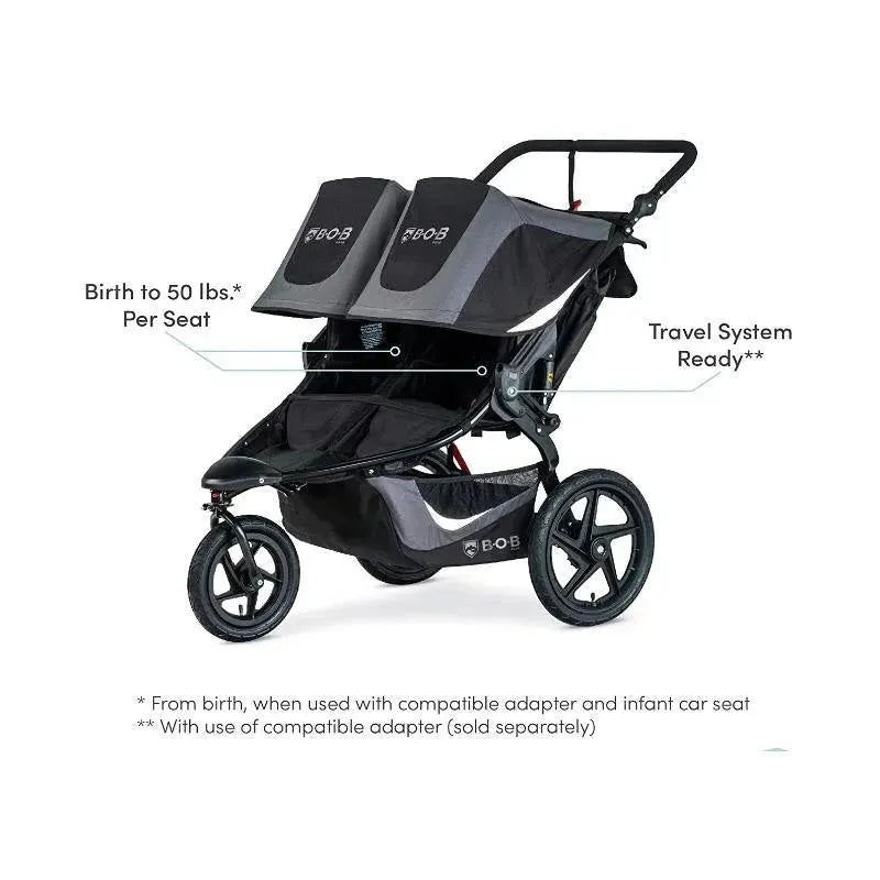 Double jogging stroller in black by BOB with two seats, adjustable canopies, and features for infants and travel system readiness.