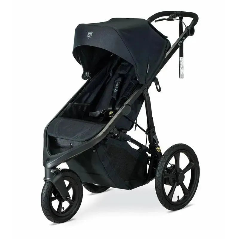 BOB Wayfinder Jogging Stroller in Nightfall color, featuring a sleek design and large wheels for easy maneuverability.