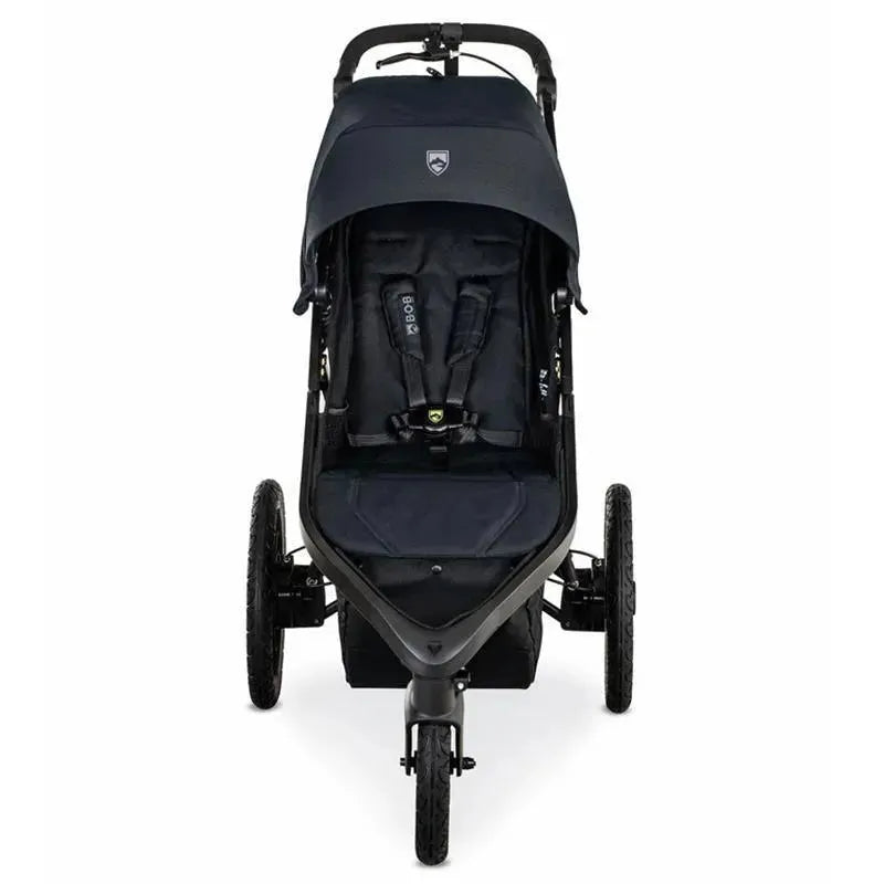 BOB Wayfinder Jogging Stroller in Nightfall color, featuring a sleek black design, adjustable canopy, and secure 5-point harness.