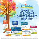 Boiron SleepCalm Kids Liquid Doses, 15 count, depicted with other Boiron products against a colorful tree backdrop.