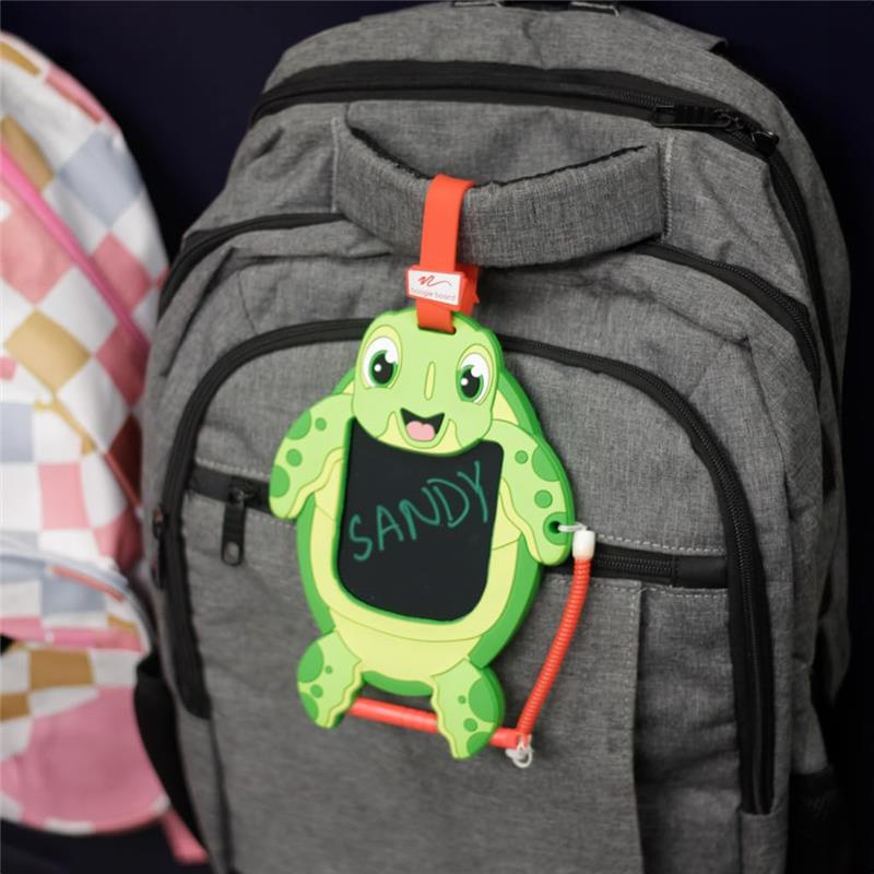 Kids sketch pad shaped like Sandy the Sea Turtle attached to a grey backpack, featuring a black drawing surface.