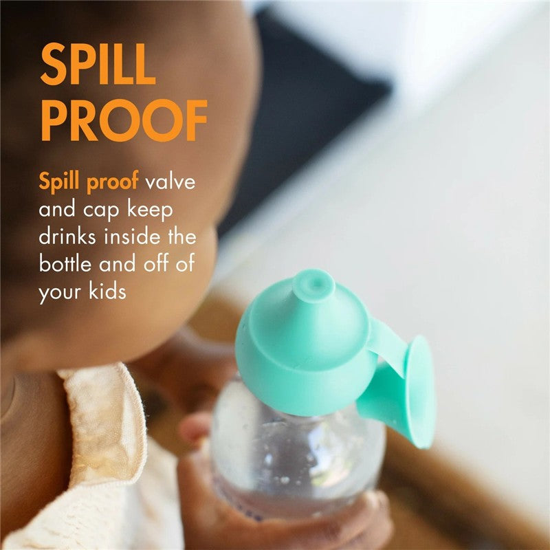 Boon SNUG Silicone Bottle Topper in mint green on a clear bottle, promoting spill-proof features for kids.