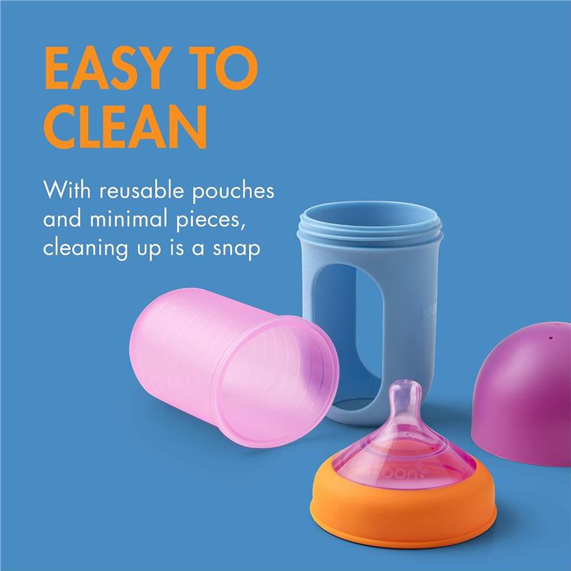 Boon 3Pk Nursh Silicone Baby Bottles in color block, showcasing easy-to-clean reusable pouches and parts on a blue background.