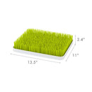 Boon LAWN Countertop Drying Rack in green and white, 13.5” x 11” x 2.4”, with grass-like prongs for drying baby items.