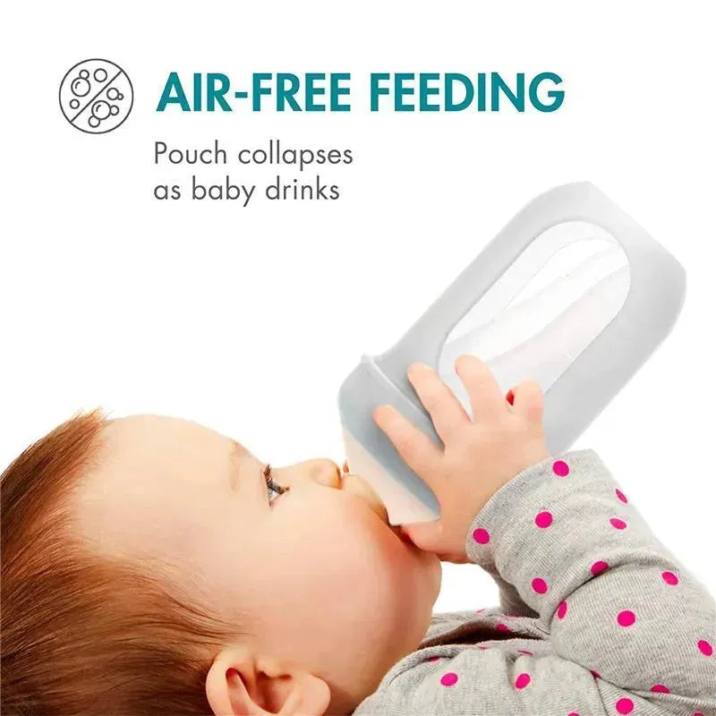 Boon Nursh 8oz baby bottle in gray multi, featuring an air-free feeding design, held by a baby drinking from it.