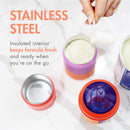 Boon Triful Baby Formula Dispenser in pink, with purple and orange sections, showing a scoop of formula and text about its stainless steel insulation.