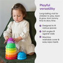 Boppy Foam Play Mat for children, featuring a child stacking colorful cups, designed for versatile play and easy cleaning.