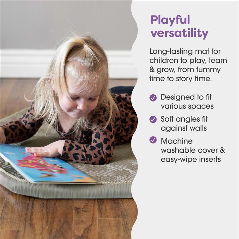 Boppy Foam Play Mat in Natural-Maze Tan, featuring a child reading a book on its non-skid surface.
