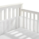 Classic Breathable Mesh Crib Liner in white, fitted securely in a white crib, providing safety while enhancing airflow.