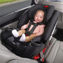 Convertible car seat in mineral gray with a smiling baby securely strapped in, featuring cup holders and safety labels.