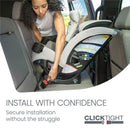 A person installing a Britax One4Life Slim All in One Car Seat in a vehicle, highlighting its ClickTight installation feature.