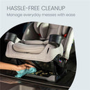 Britax One4Life Slim All in One Car Seat in Raven Black, showing a hand cleaning under the seat with a cloth.