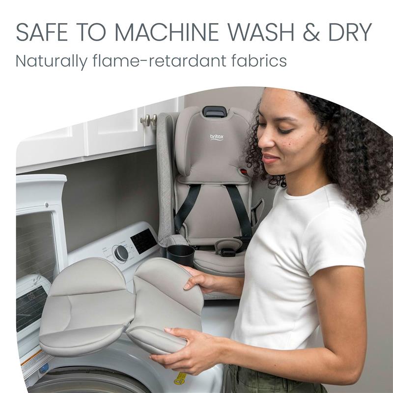 Britax One4Life Slim All in One Car Seat, Raven Black, shown being cleaned with removable fabric in a laundry setting.