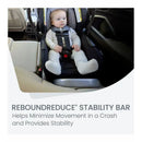 Baby seated in a Britax car seat with a ReboundReduce® Stability Bar for enhanced safety during car travel.