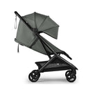 Compact Bugaboo Butterfly 2 stroller in black and forest green, featuring a large canopy and a lightweight frame.