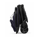 Bugaboo Butterfly 2 Plus Complete Stroller in Deep Indigo, shown in a compact, folded position with black frame and wheels.
