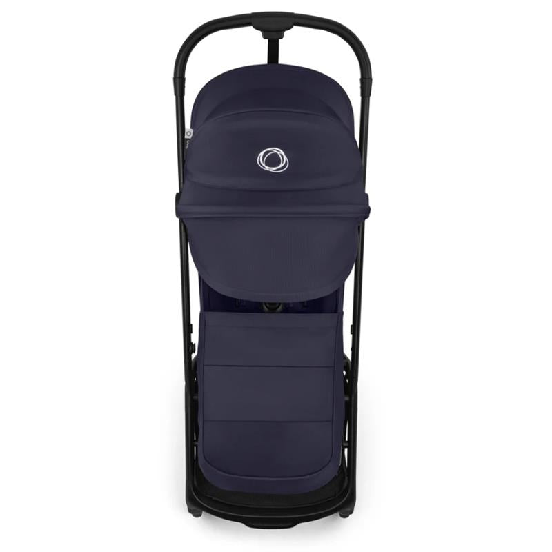 Bugaboo Butterfly 2 Plus Complete Stroller in Deep Indigo with a canopy and storage basket, angled view from above.