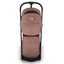 Bugaboo Butterfly 2 Plus Complete Stroller in Dusty Pink, featuring a sleek design with a canopy and storage pouch.