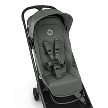 Bugaboo Butterfly 2 Plus Complete Stroller in Forest Green with a padded seat and harness system, showcasing its modern design.