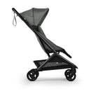 Bugaboo Butterfly 2 Plus Complete Stroller in Forest Green, featuring a sleek design with a canopy and black frame.