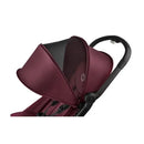Compact Bugaboo Butterfly stroller in Dark Cherry color with a protective canopy and adjustable handlebar.