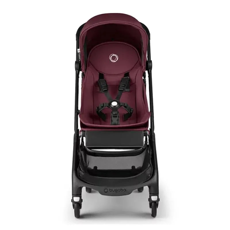Compact Bugaboo Butterfly stroller in dark cherry color with a safety harness and storage basket.