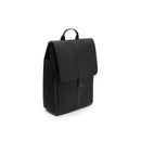 Changing backpack in Midnight Black, featuring a minimalist design, top handle, and flap closure.
