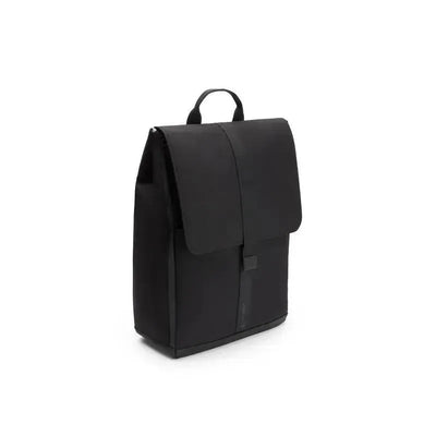 Changing backpack in Midnight Black, featuring a minimalist design, top handle, and flap closure.