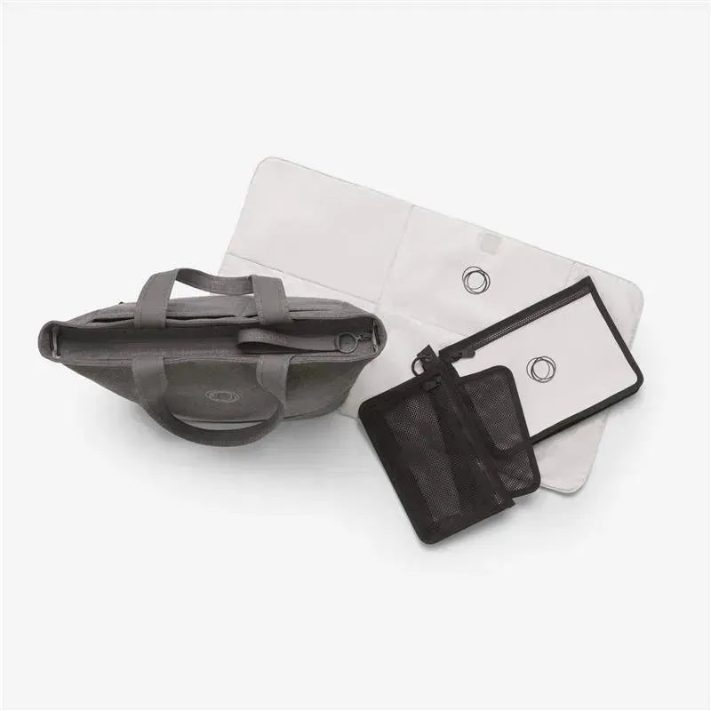 Grey melange changing bag with handles, accompanied by changing mat and two zippered pouches.